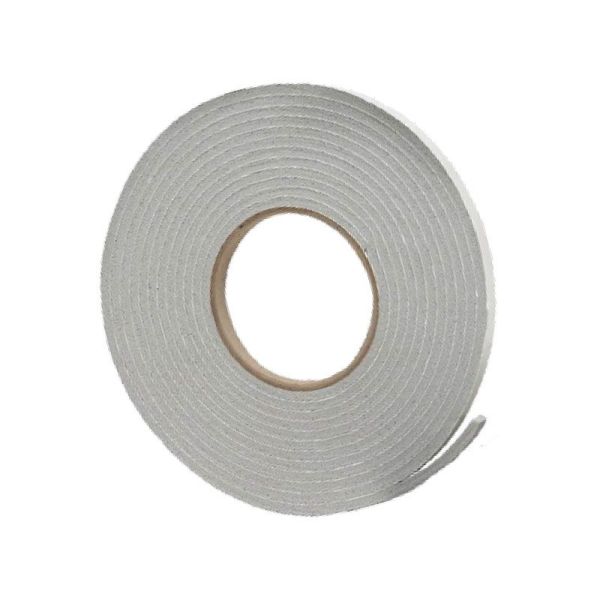 A roll of white door weatherstripping on a cardboard roll on a white background